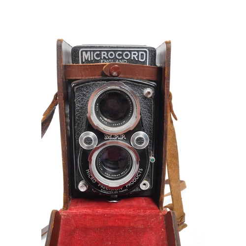 287 - M.P.P Microcord - A mid 20th century M.P.P Microcord 6x6 120 film medium format TLR camera. The came... 