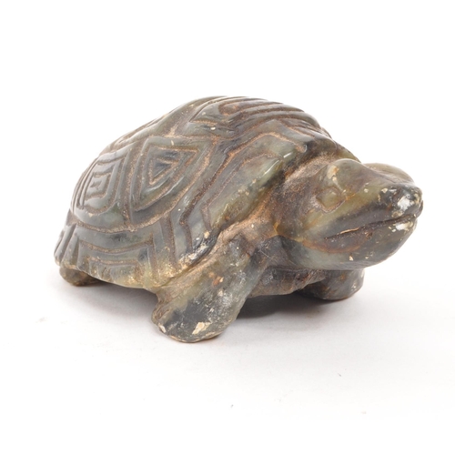 294 - A 19th Century Chinese soap stone carved figure in the form of a tortoise, engraved C. Tandi to base... 