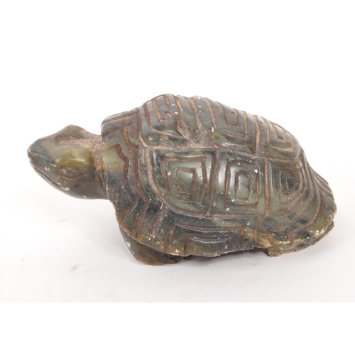 294 - A 19th Century Chinese soap stone carved figure in the form of a tortoise, engraved C. Tandi to base... 