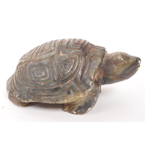 294 - A 19th Century Chinese soap stone carved figure in the form of a tortoise, engraved C. Tandi to base... 