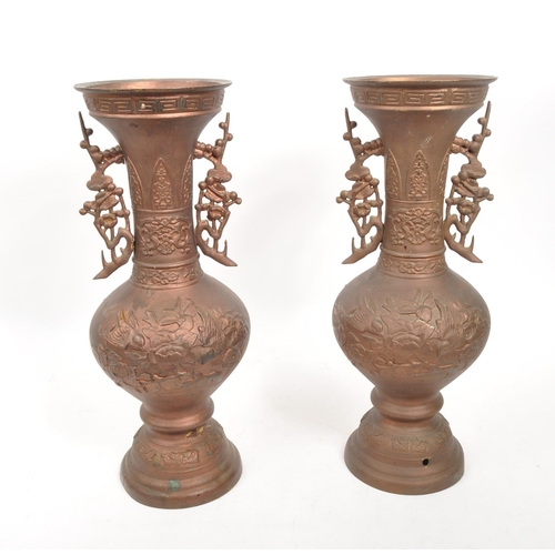 295 - A pair of early 20th Century Chinese circa 1930s spelter twin vase lamp conversions having cherry bl... 