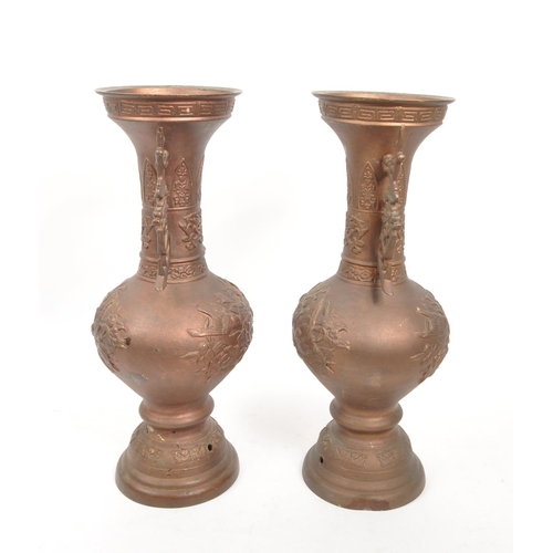 295 - A pair of early 20th Century Chinese circa 1930s spelter twin vase lamp conversions having cherry bl... 