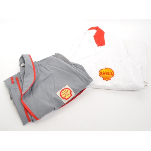 296 - Shell Oil - Two 20th century Shell Oil petrol station forecourt / workshop jackets / coats. One bein... 