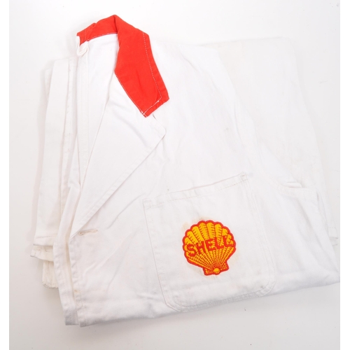 296 - Shell Oil - Two 20th century Shell Oil petrol station forecourt / workshop jackets / coats. One bein... 