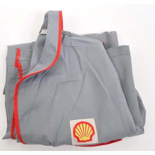 296 - Shell Oil - Two 20th century Shell Oil petrol station forecourt / workshop jackets / coats. One bein... 