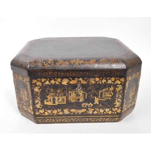 298 - A 19th Century Canton lacquered box having swing handles to sides and gilt painted oriental designs ... 