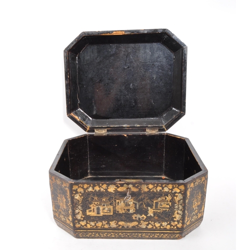 298 - A 19th Century Canton lacquered box having swing handles to sides and gilt painted oriental designs ... 