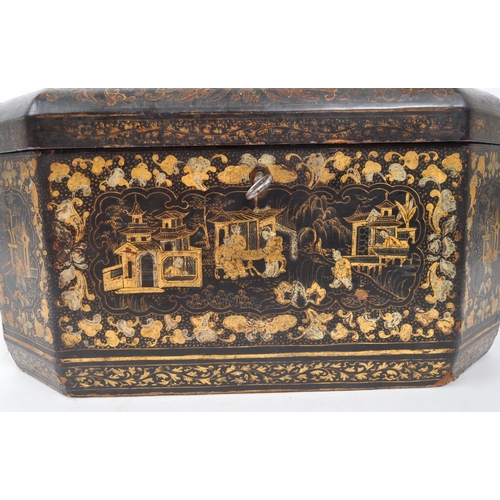 298 - A 19th Century Canton lacquered box having swing handles to sides and gilt painted oriental designs ... 