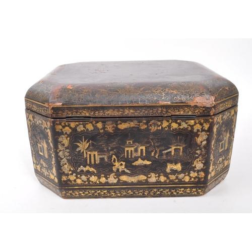 298 - A 19th Century Canton lacquered box having swing handles to sides and gilt painted oriental designs ... 