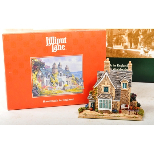 316 - Lilliput Lane - A collection of eleven boxed Lilliput Lane sculpture figures. The collection to incl... 