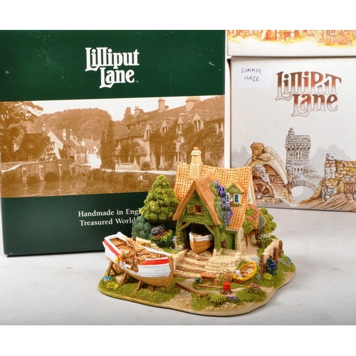 316 - Lilliput Lane - A collection of eleven boxed Lilliput Lane sculpture figures. The collection to incl... 