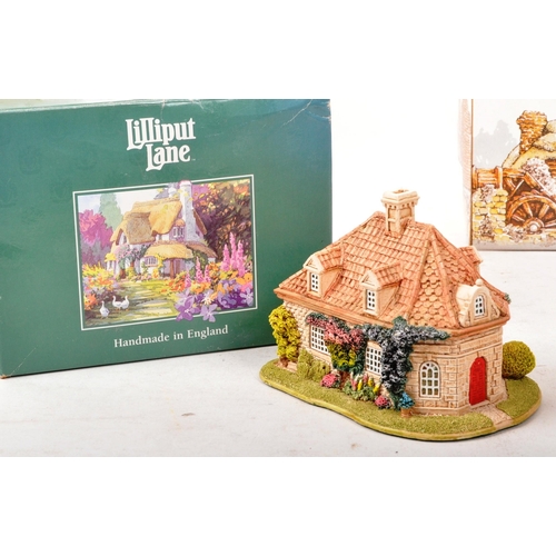 316 - Lilliput Lane - A collection of eleven boxed Lilliput Lane sculpture figures. The collection to incl... 