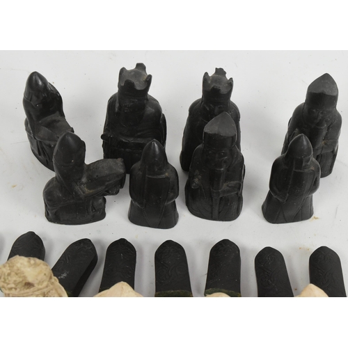 318 - Isle of Lewis - Two sets of Isle of Lewis chess pieces modelled after the 12th Century Medieval Scot... 