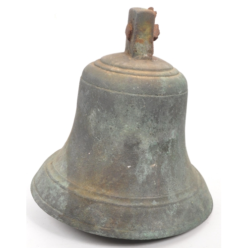 324 - An early 20th century large brass bell, complete with striker, tapering form with rusted fixings. 32... 