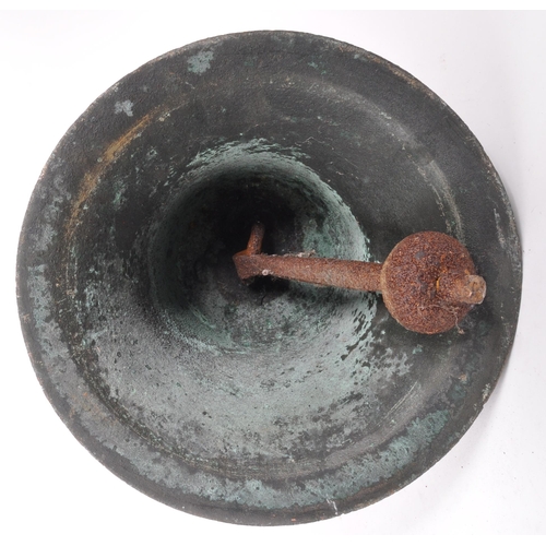 324 - An early 20th century large brass bell, complete with striker, tapering form with rusted fixings. 32... 