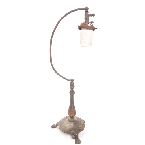 325 - Early 20th century free standing table gas lamp. Brass base with paw feet, curved arm with air flow ... 