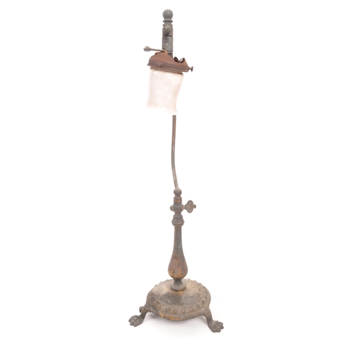 325 - Early 20th century free standing table gas lamp. Brass base with paw feet, curved arm with air flow ... 