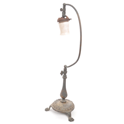 325 - Early 20th century free standing table gas lamp. Brass base with paw feet, curved arm with air flow ... 