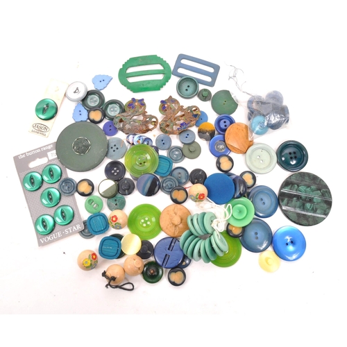 333 - A collection of 20th Century vintage buttons in blue / green colourway. Having varying sizes and sha... 