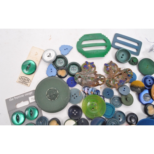 333 - A collection of 20th Century vintage buttons in blue / green colourway. Having varying sizes and sha... 