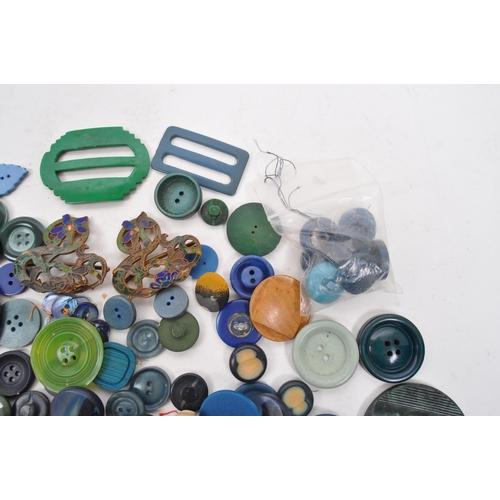 333 - A collection of 20th Century vintage buttons in blue / green colourway. Having varying sizes and sha... 