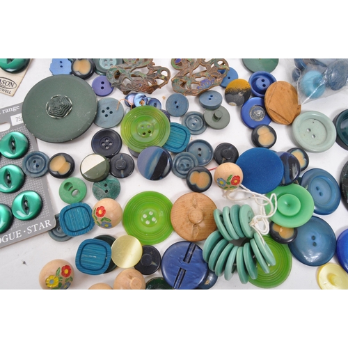 333 - A collection of 20th Century vintage buttons in blue / green colourway. Having varying sizes and sha... 