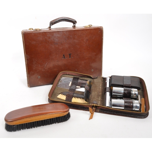 339 - A mid Century circa 1950s gentleman's stitched carry case / briefcase with A.T. stamped to front and... 