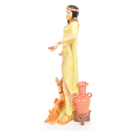 34 - Royal Doulton - A porcelain china limited edition Royal Doulton figurine from the Egyptian Queens co... 