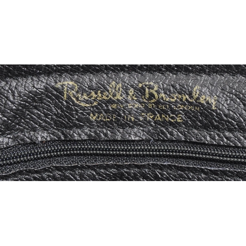 341 - Russell & Bromley - A black patent leather Russell & Bromley handbag. The handbag having impressed R... 