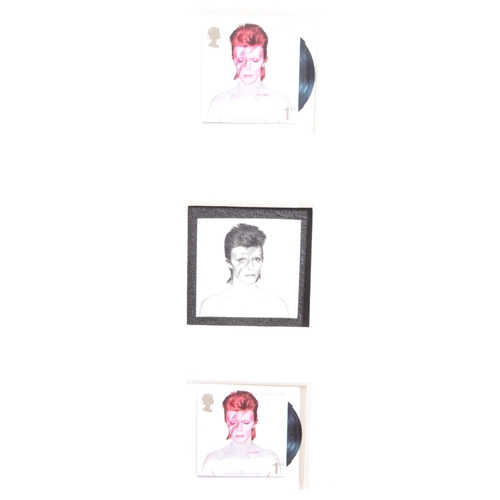 343 - David Bowie - an Aladdin Sane Royal Mail Anniversary Frame. Including five stamps by Royal Mail base... 