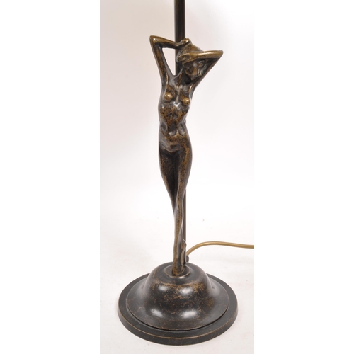 352 - A 20th century Art Deco style brass table lamp. The lamp having a rounded brass base, with nude fema... 