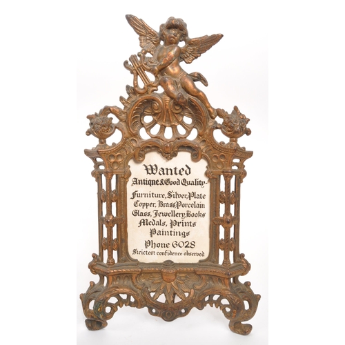 353 - A pair of late 19th Century French decorative brass photo frames with harp playing cherub to top. Th... 