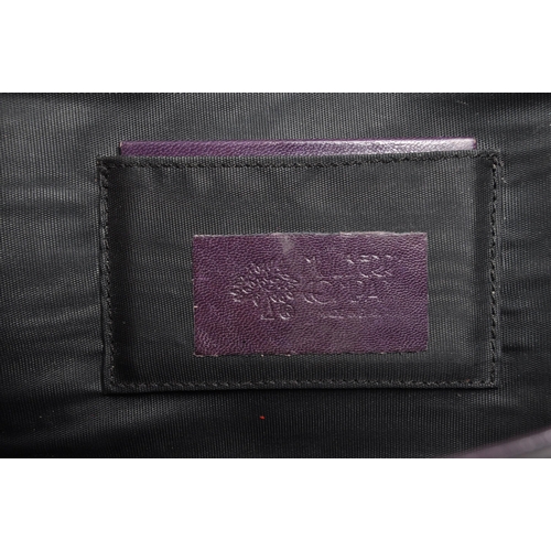 355 - Mulberry - A vintage Mulberry leather clutch bag / purse. The clutch in plum tone leather, with two ... 