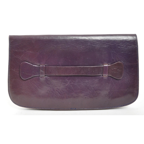 355 - Mulberry - A vintage Mulberry leather clutch bag / purse. The clutch in plum tone leather, with two ... 