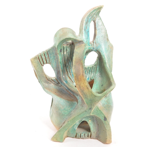 357 - A vintage 20th century studio art pottery 3D sculpture. The abstract sculpture of freeform work fini... 