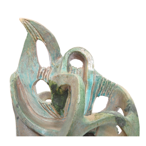 357 - A vintage 20th century studio art pottery 3D sculpture. The abstract sculpture of freeform work fini... 