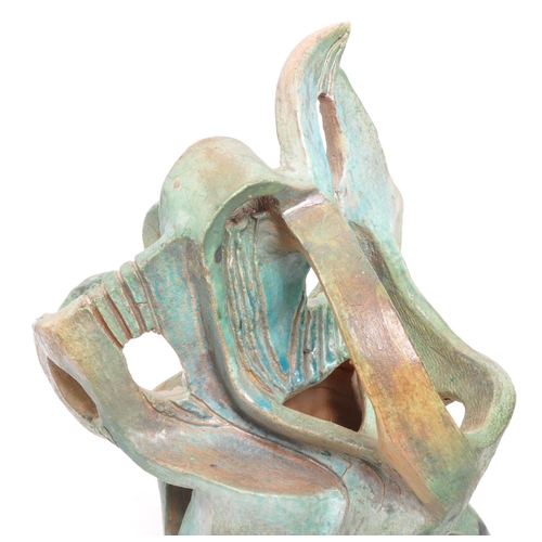 357 - A vintage 20th century studio art pottery 3D sculpture. The abstract sculpture of freeform work fini... 