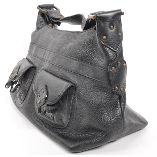 358 - Mulberry - A vintage Mulberry leather handbag. The handbag in a black colourway with twin pockets to... 