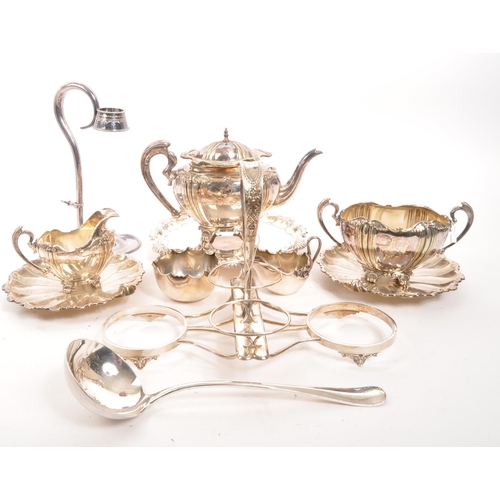 361 - A collection of early 20th century silver plated items. To include two teapots, pair of shell plates... 