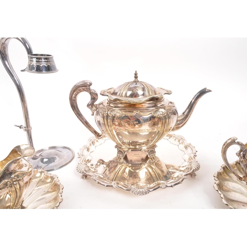 361 - A collection of early 20th century silver plated items. To include two teapots, pair of shell plates... 