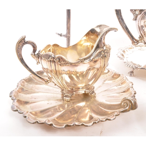 361 - A collection of early 20th century silver plated items. To include two teapots, pair of shell plates... 