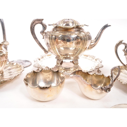 361 - A collection of early 20th century silver plated items. To include two teapots, pair of shell plates... 