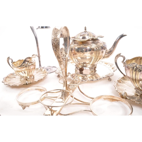 361 - A collection of early 20th century silver plated items. To include two teapots, pair of shell plates... 