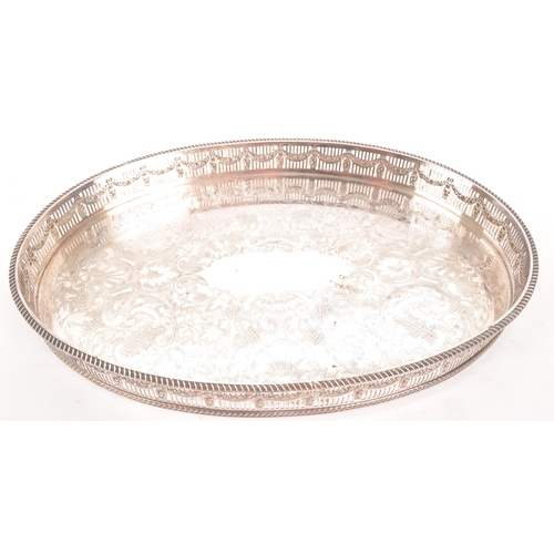 362 - Collection of 20th Century silver plate items comprising of an engraved tray with swagger band decor... 