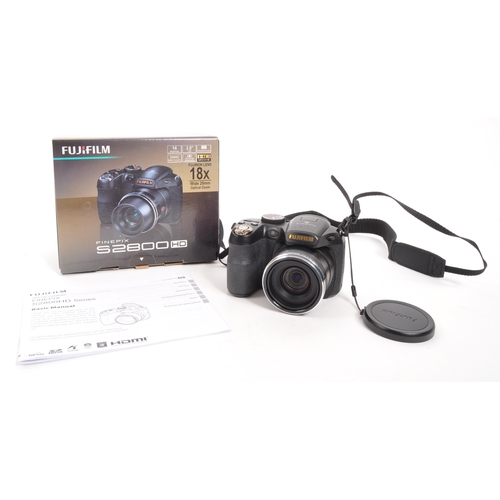 364 - Fujifilm - A circa 2010 Fujifilm Finepix S2800HD digital bridge camera. The camera in a black colour... 