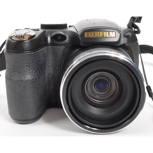 364 - Fujifilm - A circa 2010 Fujifilm Finepix S2800HD digital bridge camera. The camera in a black colour... 