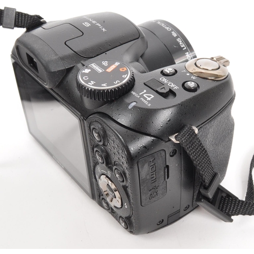 364 - Fujifilm - A circa 2010 Fujifilm Finepix S2800HD digital bridge camera. The camera in a black colour... 