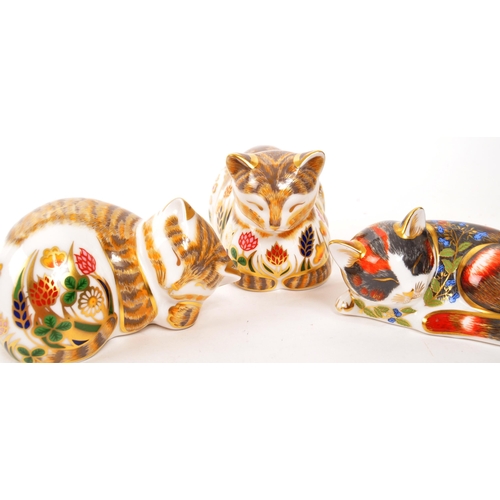 4 - Royal Crown Derby - A collection of three porcelain china Royal Crown Derby cat paperweight figures ... 