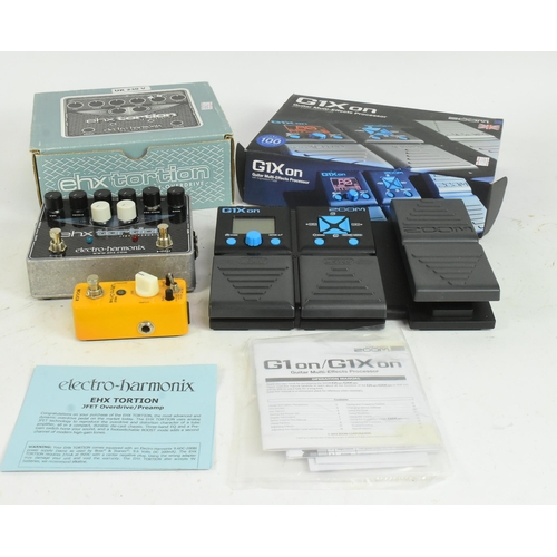 415 - Two guitar multi effects processor pedals. An electro harmonix ehx tortion guitar pedal. With G1Xon ... 