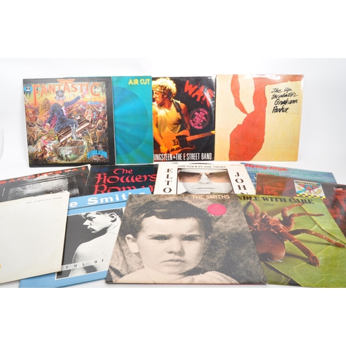 417 - A collection of late 20th century vinyl rock LP records. The collection to include Sandista - The Cl... 